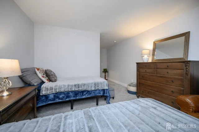 a bathroom with a shower curtain and a toilet