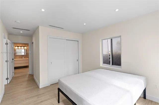 a view of livingroom with hardwood floor and hallway
