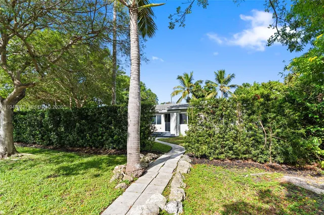 a view of a garden with pathway