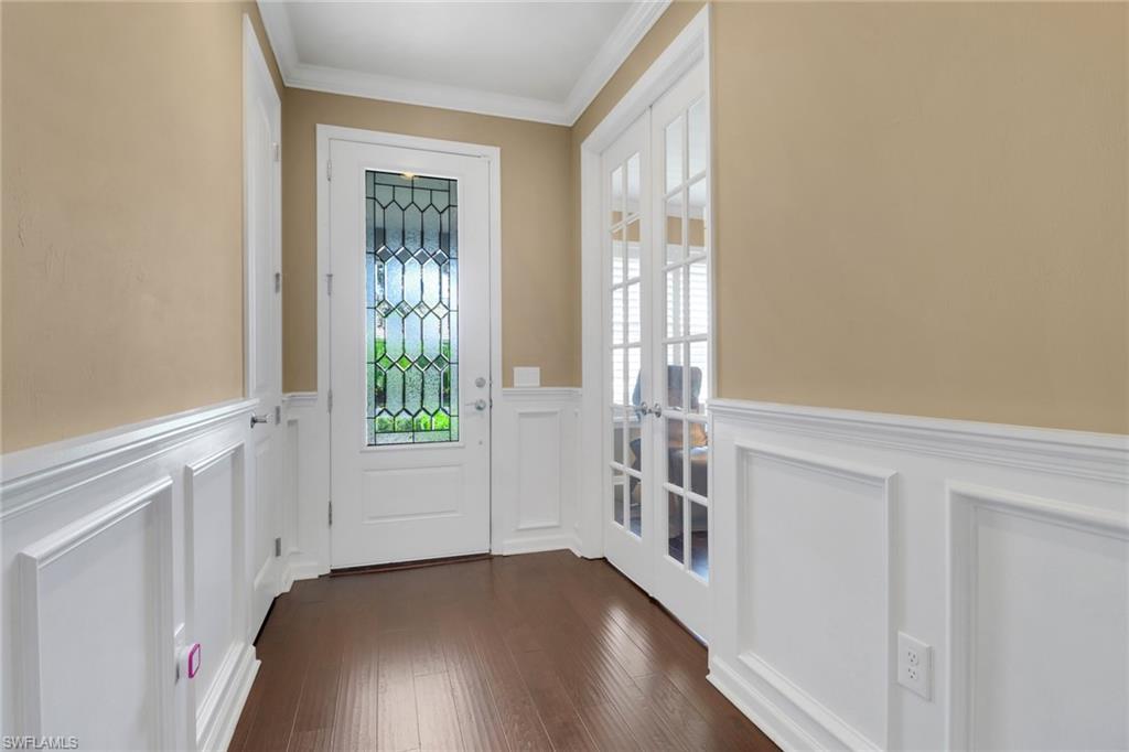 10588 Jackson Square Drive Estero, FL 33928 - Photo 3 of 50 a view of an entryway with wooden floor