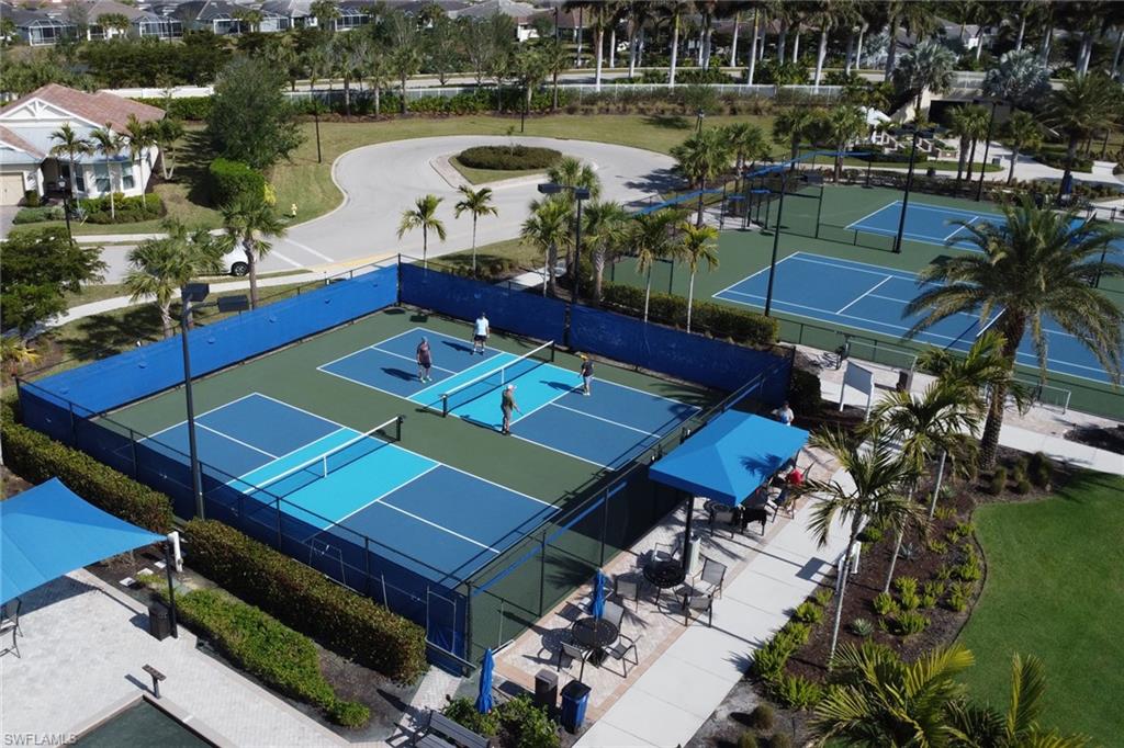 10588 Jackson Square Drive Estero, FL 33928 - Photo 46 of 50 an aerial view of a pool patio swimming pool and outdoor seating