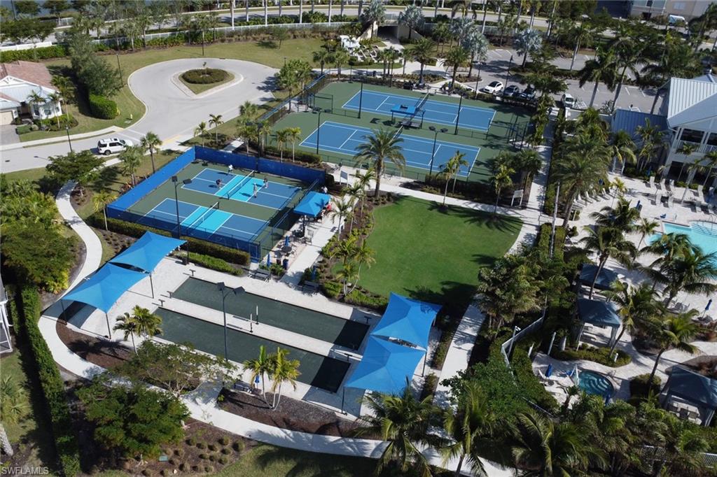 10588 Jackson Square Drive Estero, FL 33928 - Photo 47 of 50 an aerial view of a house with a garden and lake view