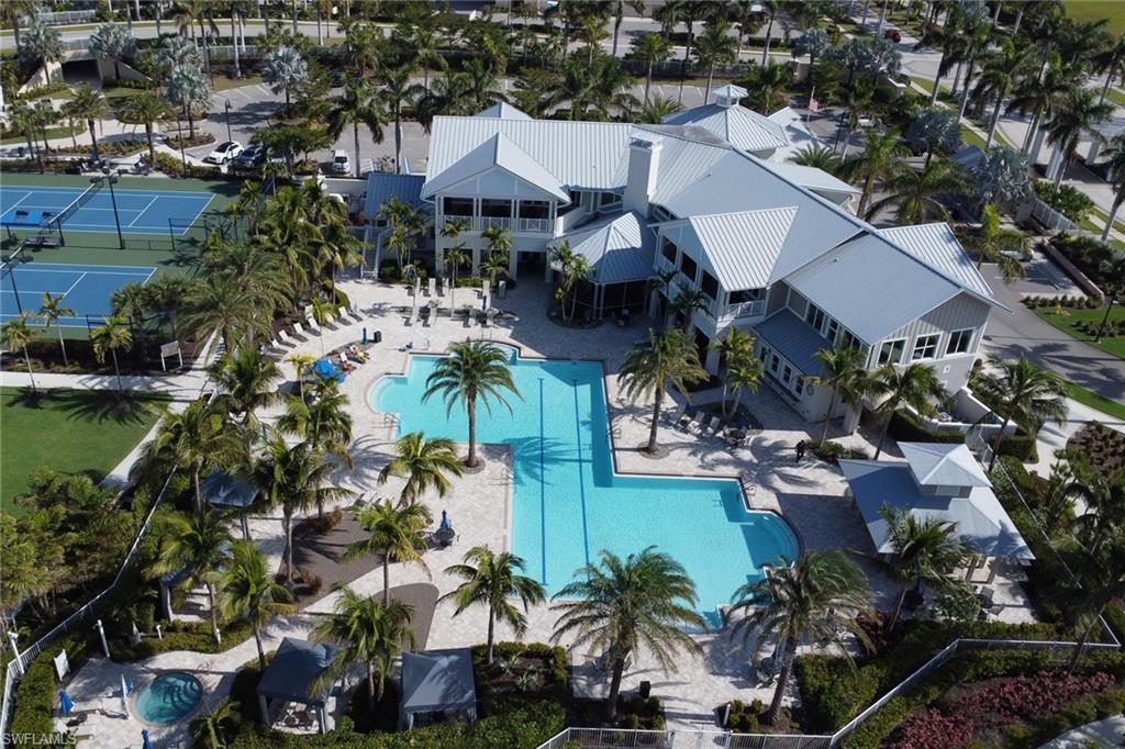 10588 Jackson Square Drive Estero, FL 33928 - Photo 48 of 50 an aerial view of house with yard and outdoor seating