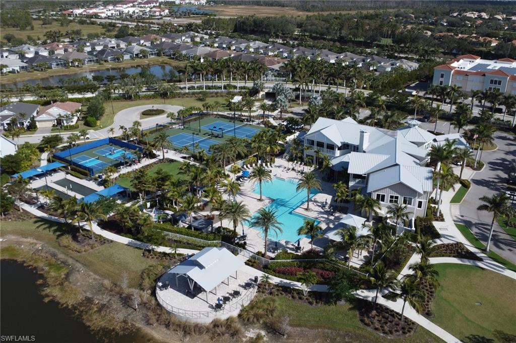 10588 Jackson Square Drive Estero, FL 33928 - Photo 50 of 50 an aerial view of residential houses with outdoor space