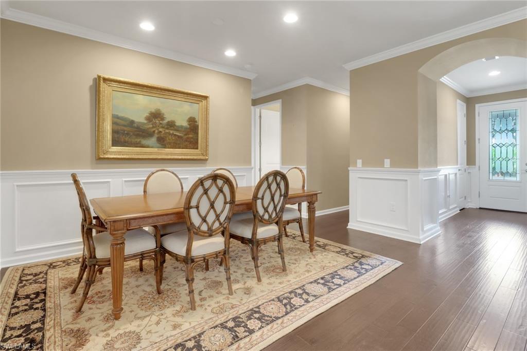 10588 Jackson Square Drive Estero, FL 33928 - Photo 5 of 50 a view of a dining room with furniture and wooden floor