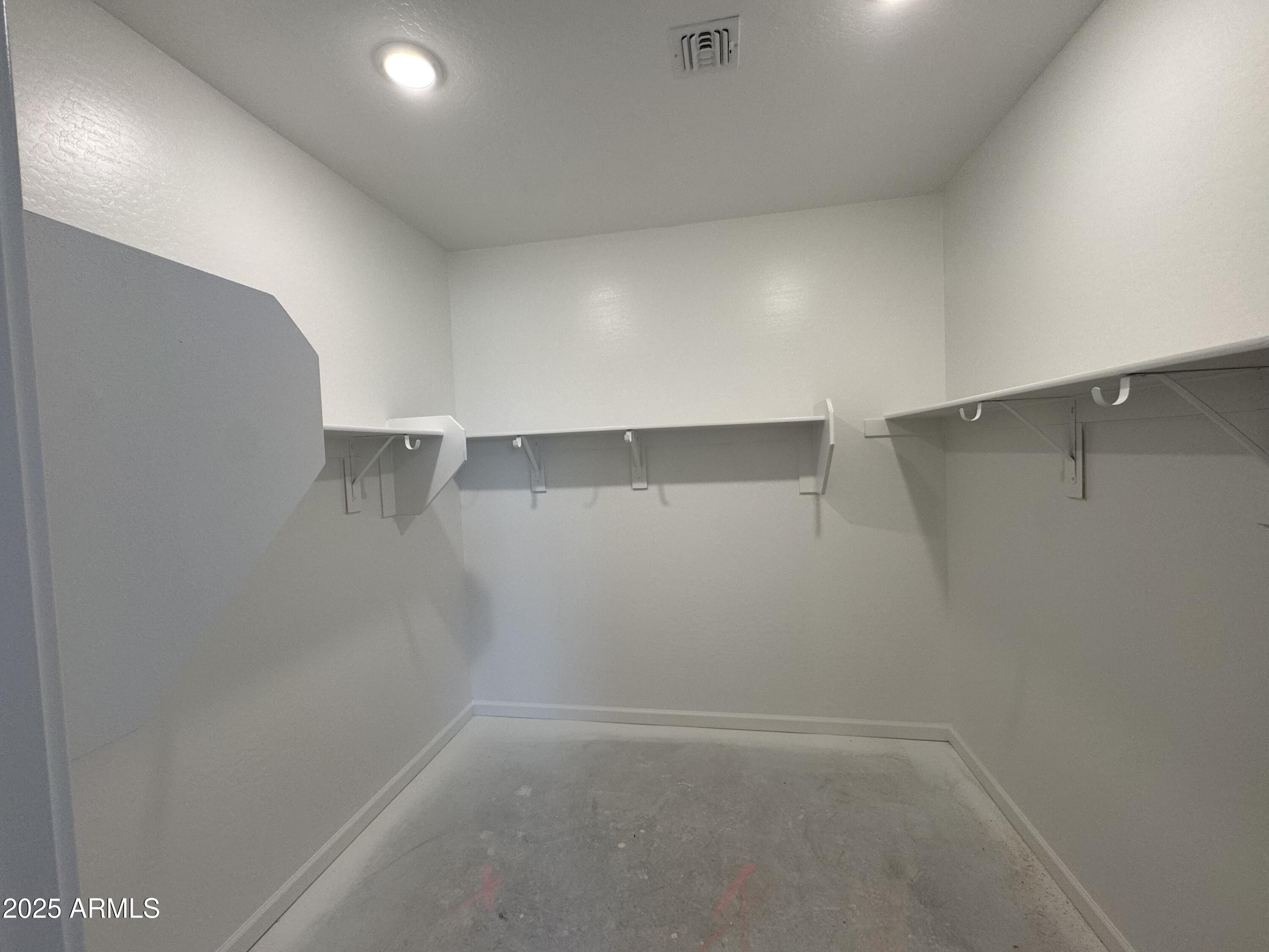 15720 West Camden Avenue Waddell, AZ 85355 - Photo 13 of 32 a view of an empty room