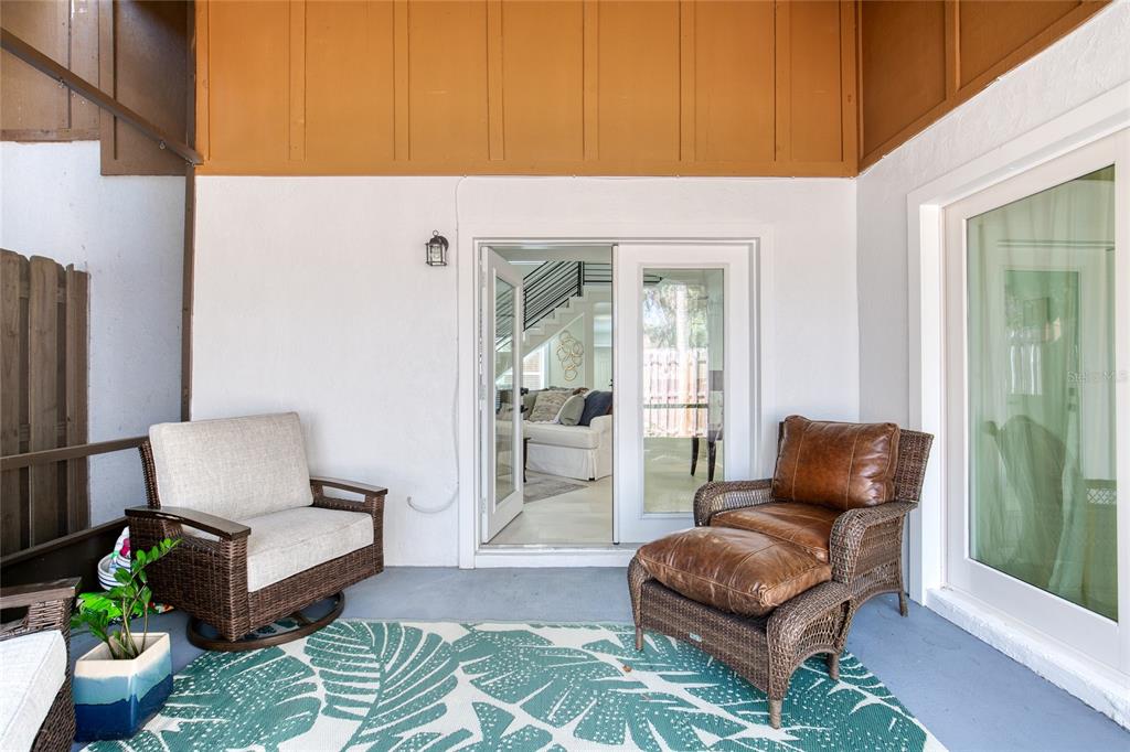 9 Soco Trail Ormond Beach, FL 32174 - Photo 53 of 74 a living room with furniture and a couch