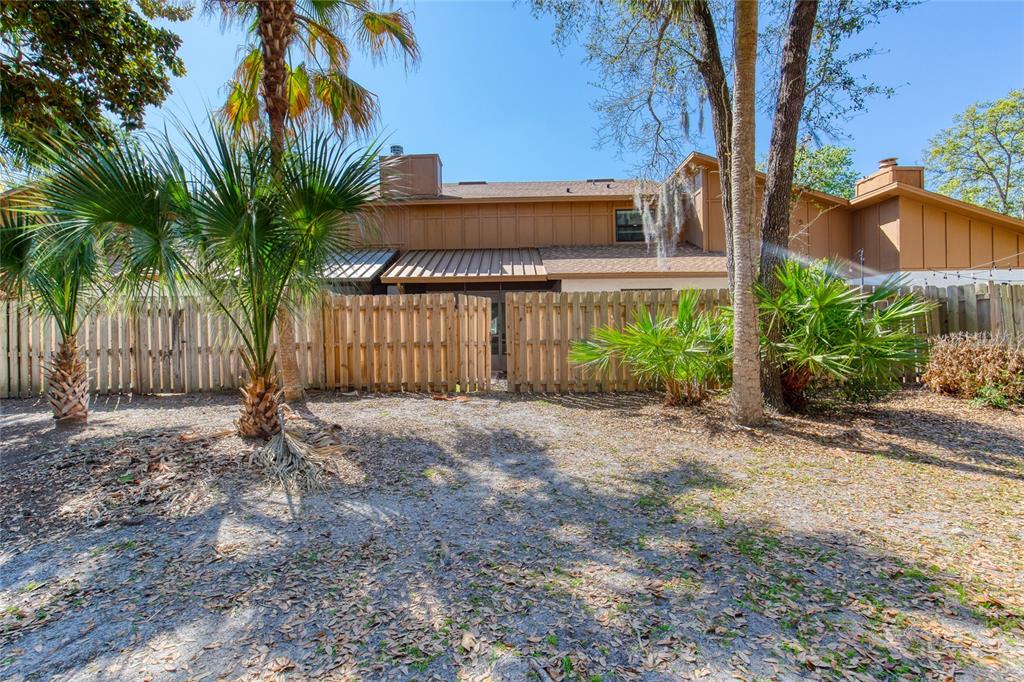 9 Soco Trail Ormond Beach, FL 32174 - Photo 56 of 74 a front view of a house with a yard and garage