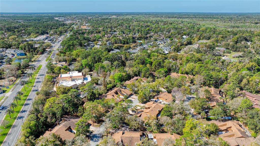 9 Soco Trail Ormond Beach, FL 32174 - Photo 70 of 74 an aerial view of a houses with a yard
