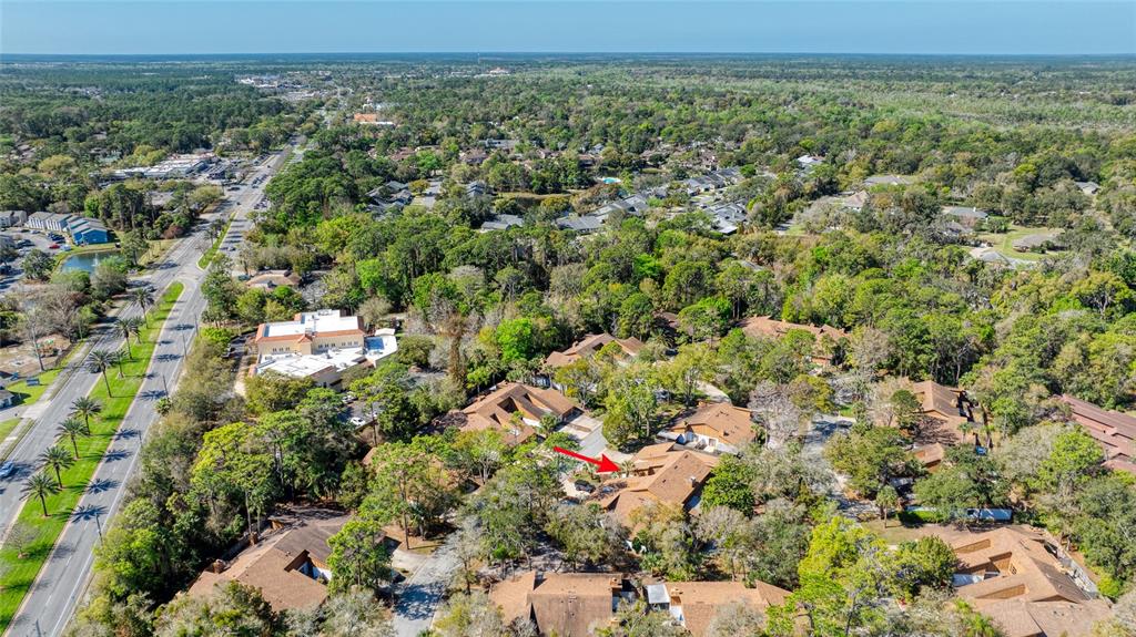 9 Soco Trail Ormond Beach, FL 32174 - Photo 71 of 74 an aerial view of a houses with a yard