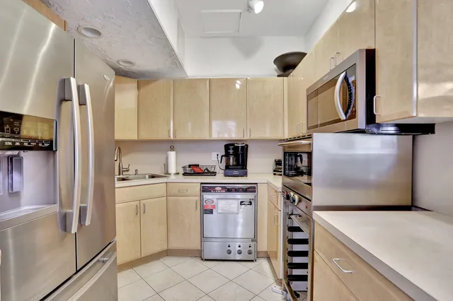 a view of a backyard with sitting area