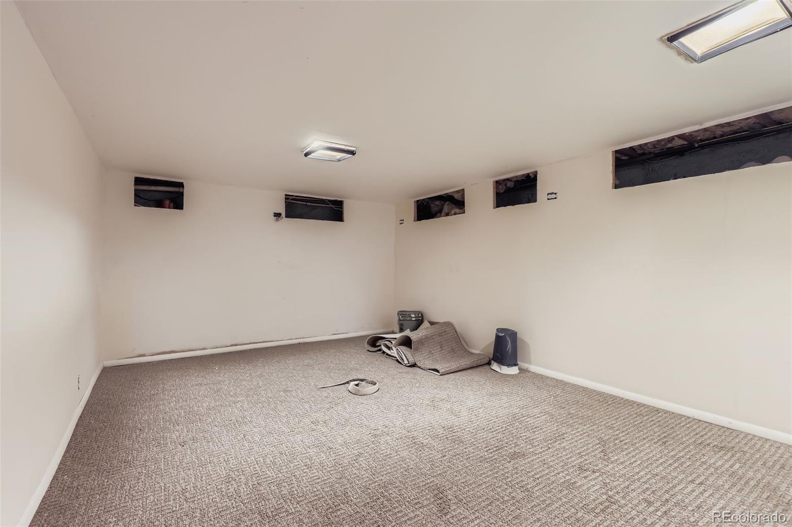 657 Meade Street Denver, CO 80204 - Photo 11 of 17 a view of room with window