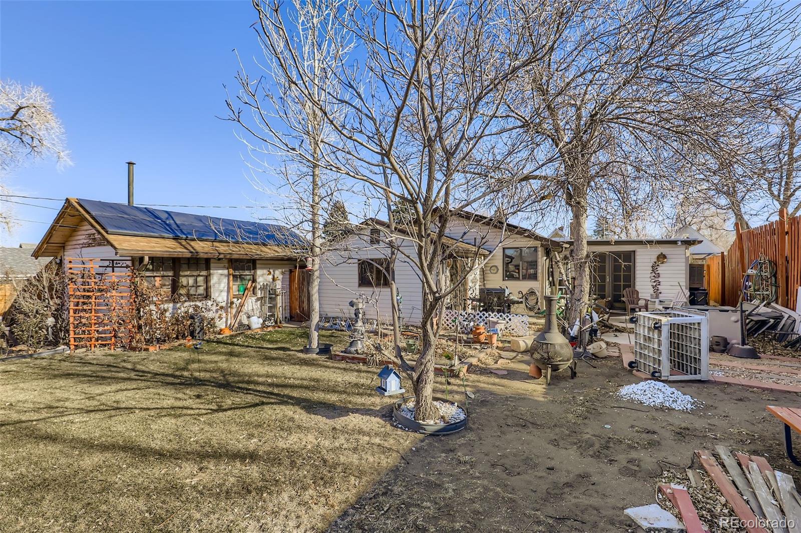 657 Meade Street Denver, CO 80204 - Photo 17 of 17 a view of a house with a yard