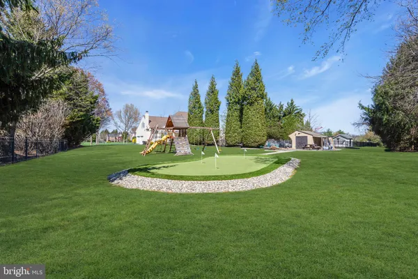 a view of a golf course with a garden