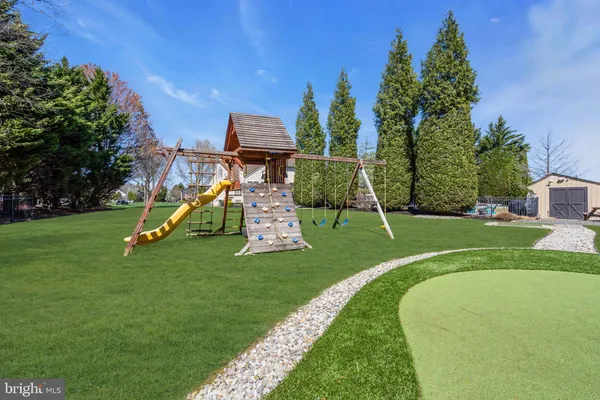 a view of a park with swings