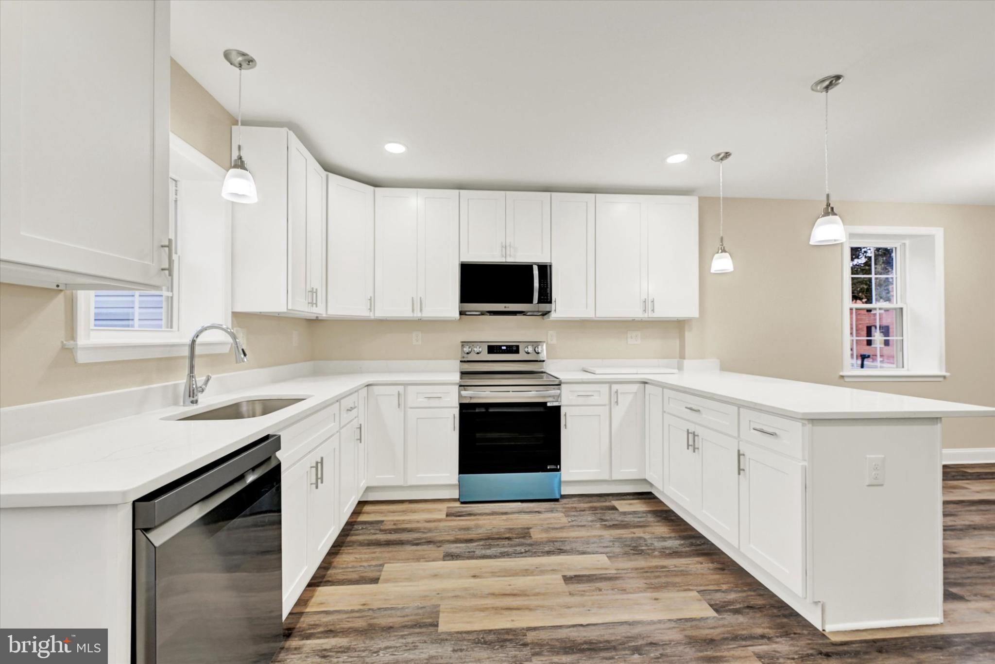 22 Cockeys Mill Road Reisterstown, MD 21136 - Photo 11 of 27 Modern kitchen with sleek white cabinetry.
