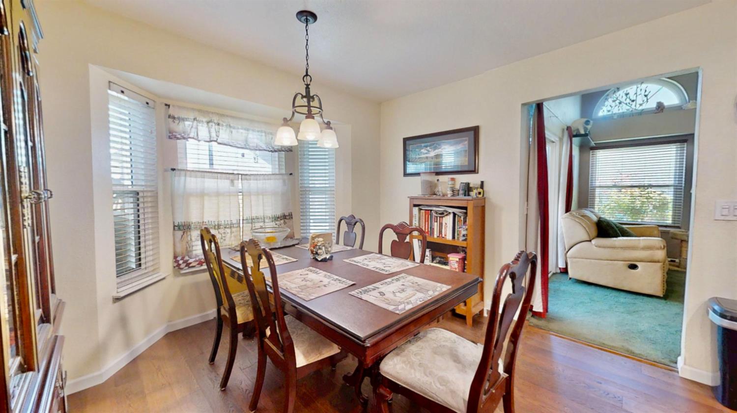 5161 Thomasino Way Antelope, CA 95843 - Photo 15 of 41 a view of a dining room with furniture window and wooden floor