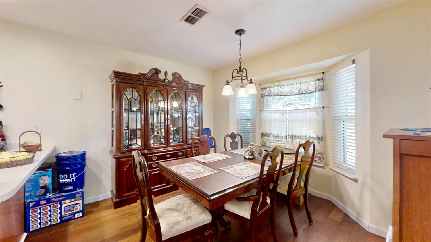 5161 Thomasino Way Antelope, CA 95843 - Photo 16 of 41 a view of a dining room with furniture window and wooden floor