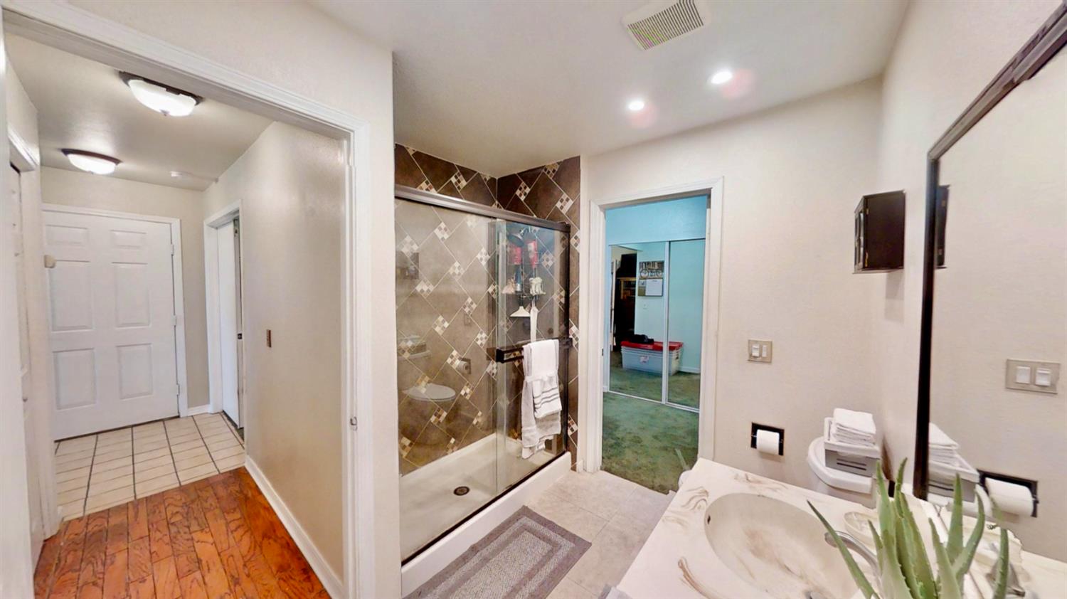5161 Thomasino Way Antelope, CA 95843 - Photo 23 of 41 a bedroom with a bed and glass door