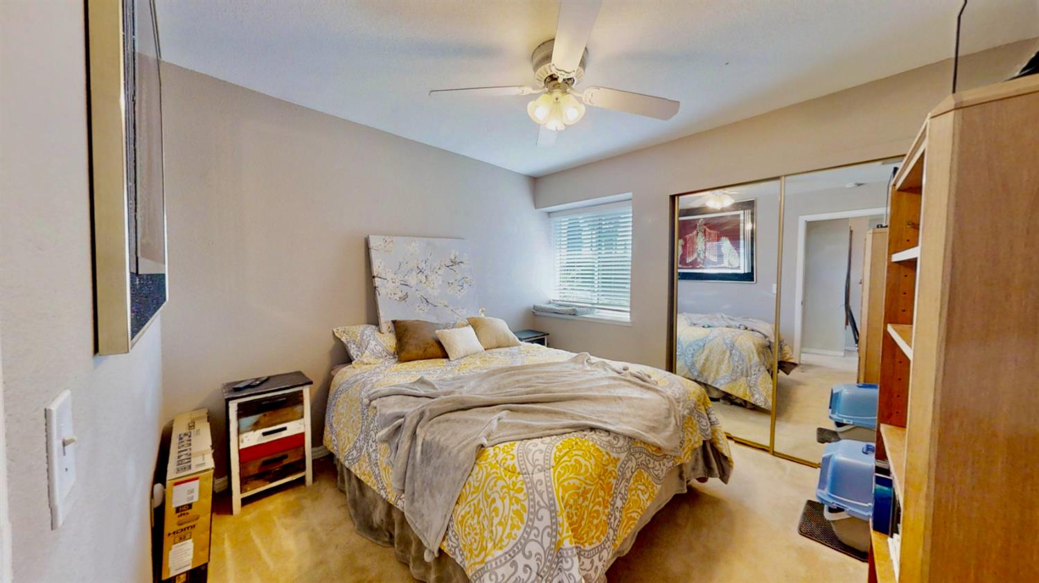 5161 Thomasino Way Antelope, CA 95843 - Photo 29 of 41 a bedroom with a bed and a chandelier