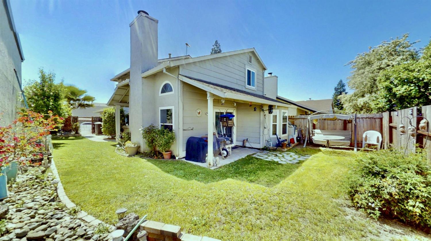 5161 Thomasino Way Antelope, CA 95843 - Photo 32 of 41 a view of a house with backyard porch and sitting area