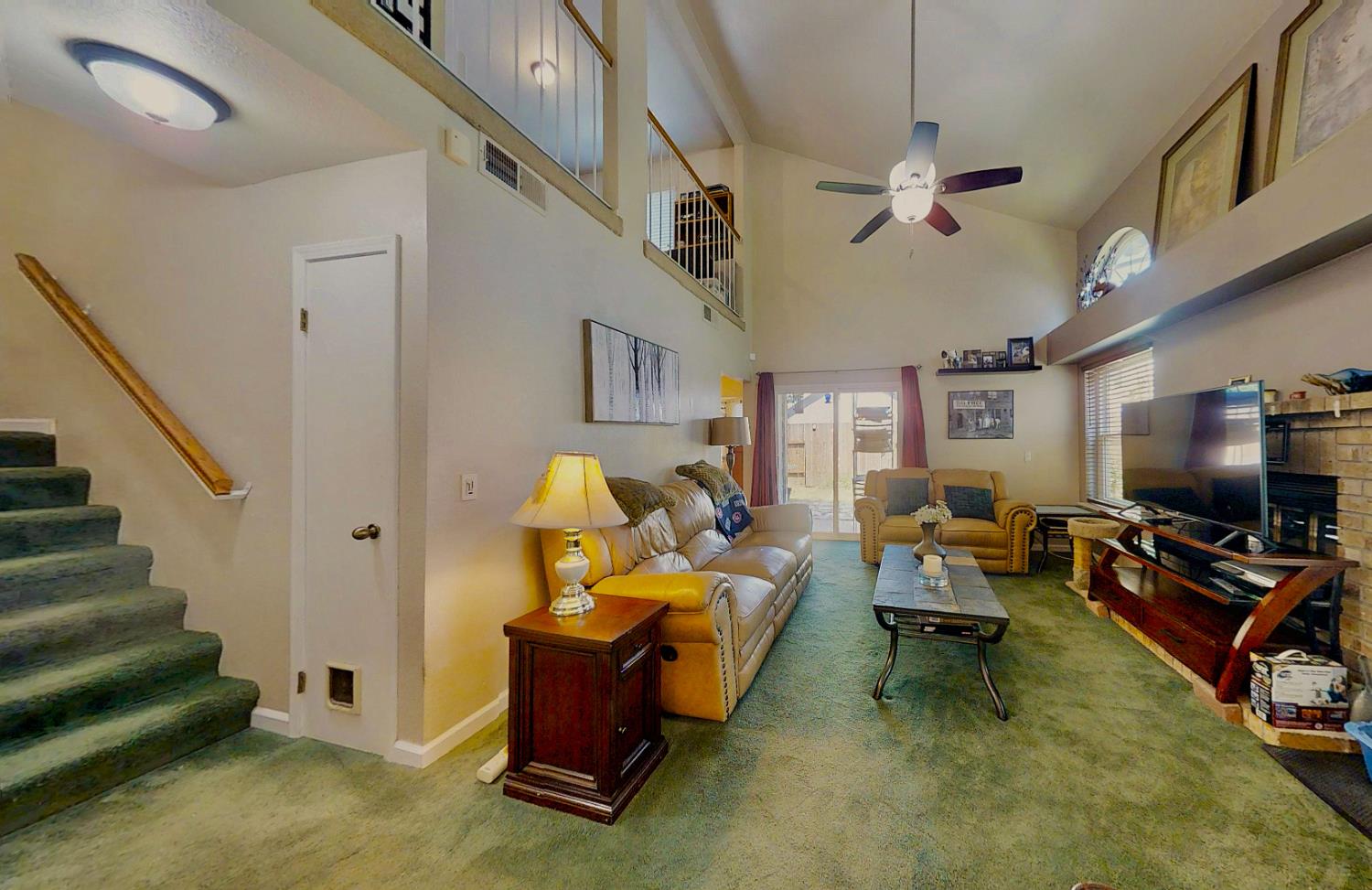 5161 Thomasino Way Antelope, CA 95843 - Photo 5 of 41 a living room with furniture and a flat screen tv