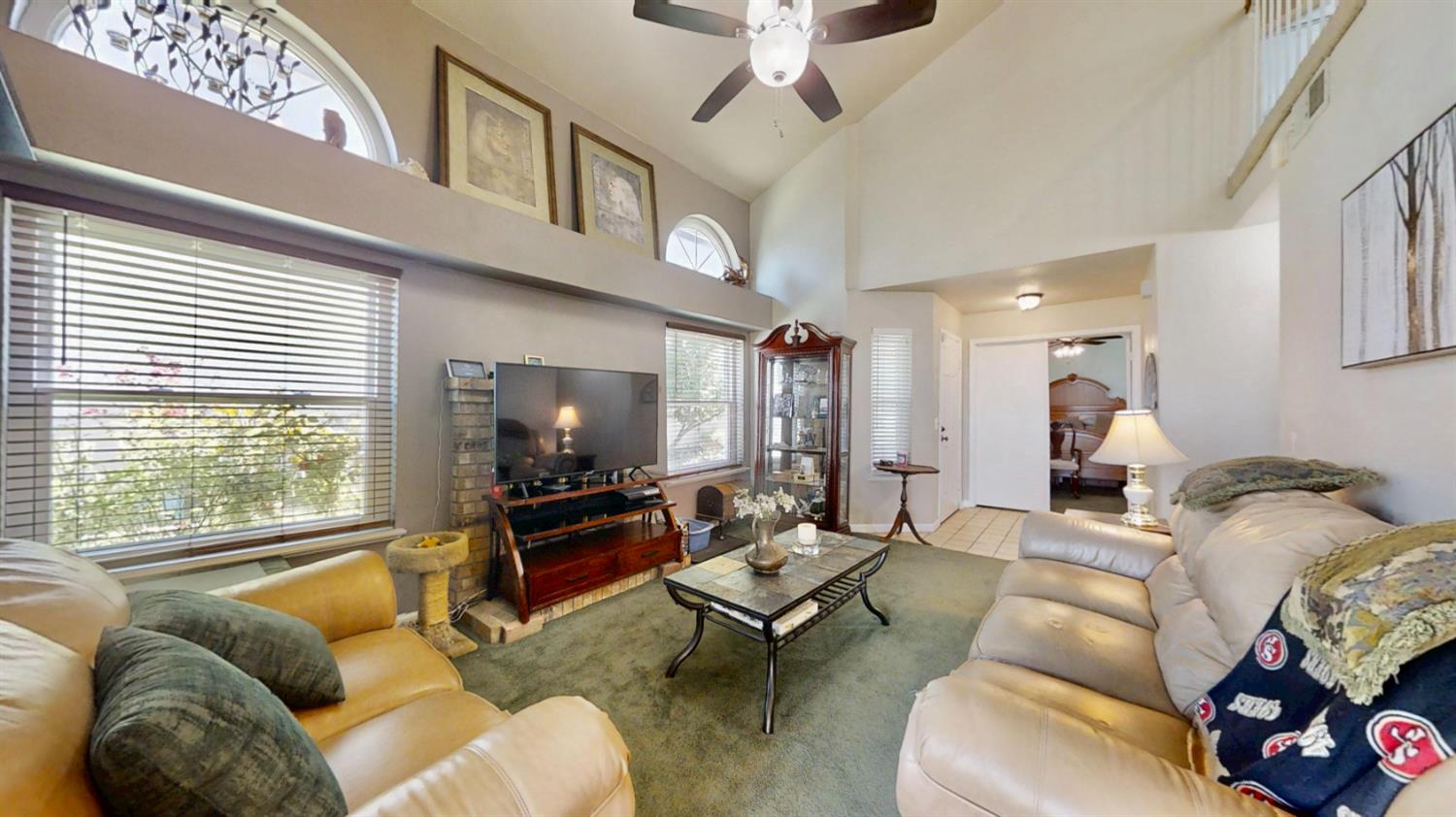 5161 Thomasino Way Antelope, CA 95843 - Photo 8 of 41 a living room with furniture and a flat screen tv