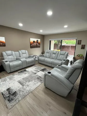 a living room with furniture and a couch