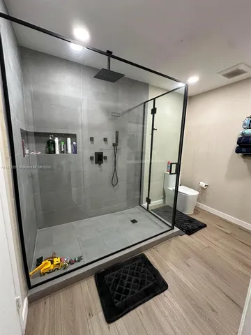 a view of a hallway with a couch