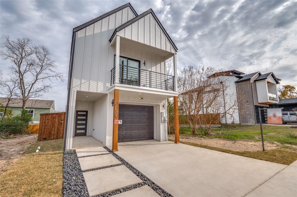 420 Sparks Street Dallas, TX 75203 - Photo 2 of 12 a front view of a house with a yard