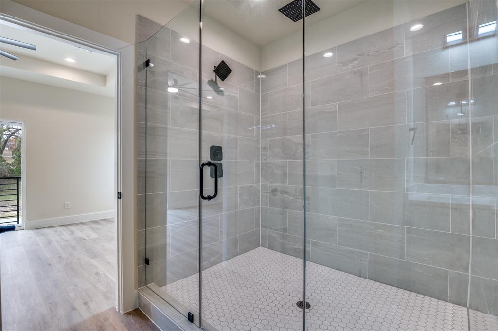 420 Sparks Street Dallas, TX 75203 - Photo 7 of 12 a bathroom with a shower and a sink