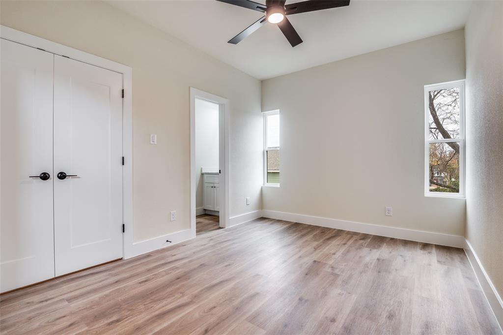 420 Sparks Street Dallas, TX 75203 - Photo 10 of 12 wooden floor in an empty room with a window