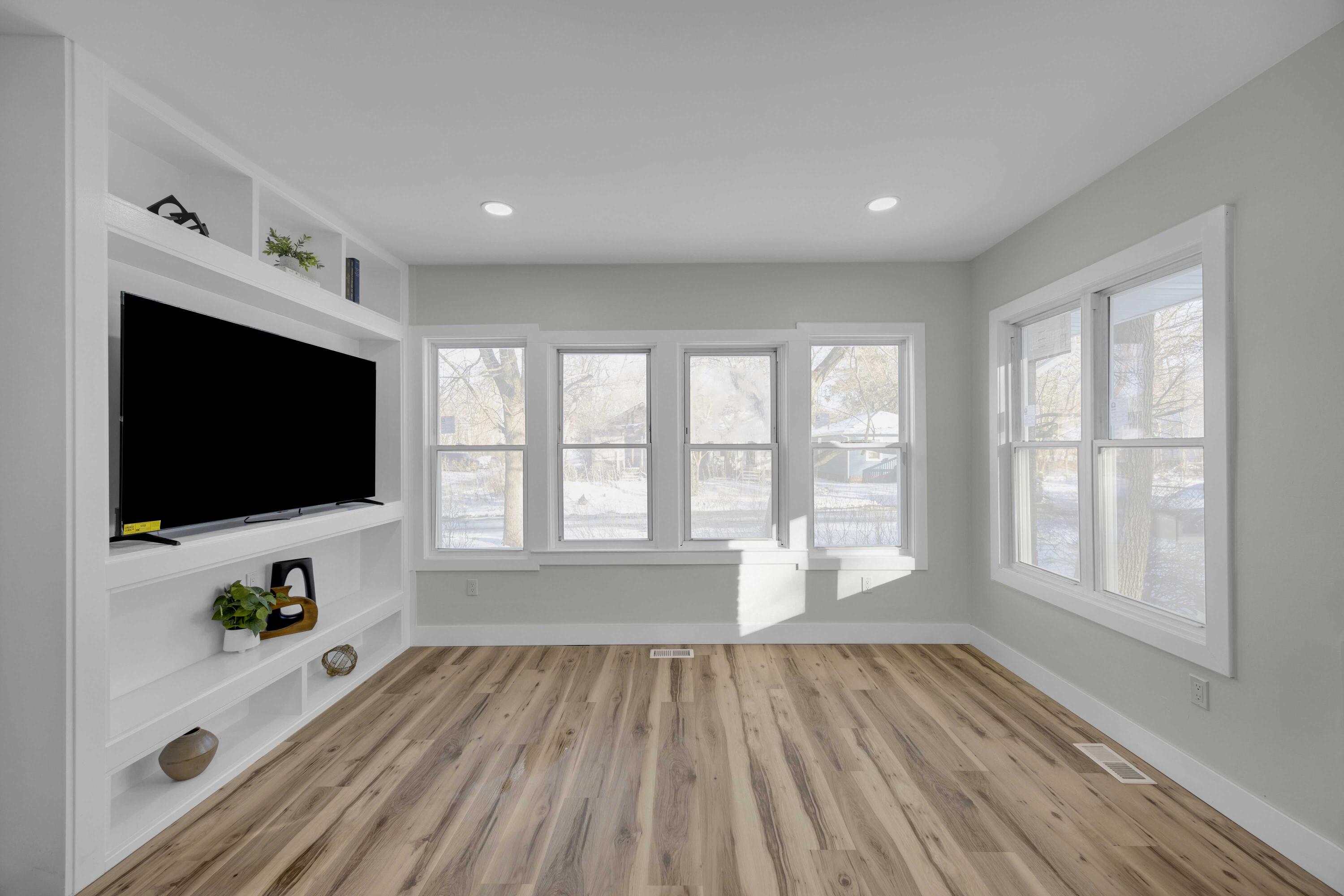 4200 Monroe Street Gary, IN 46408 - Photo 4 of 25 a living room with furniture and a flat screen tv