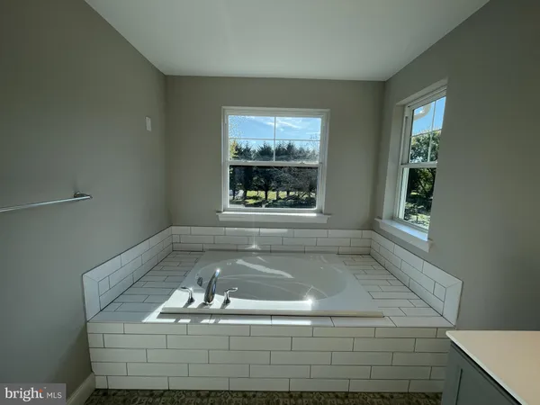 a view of water heater room with window