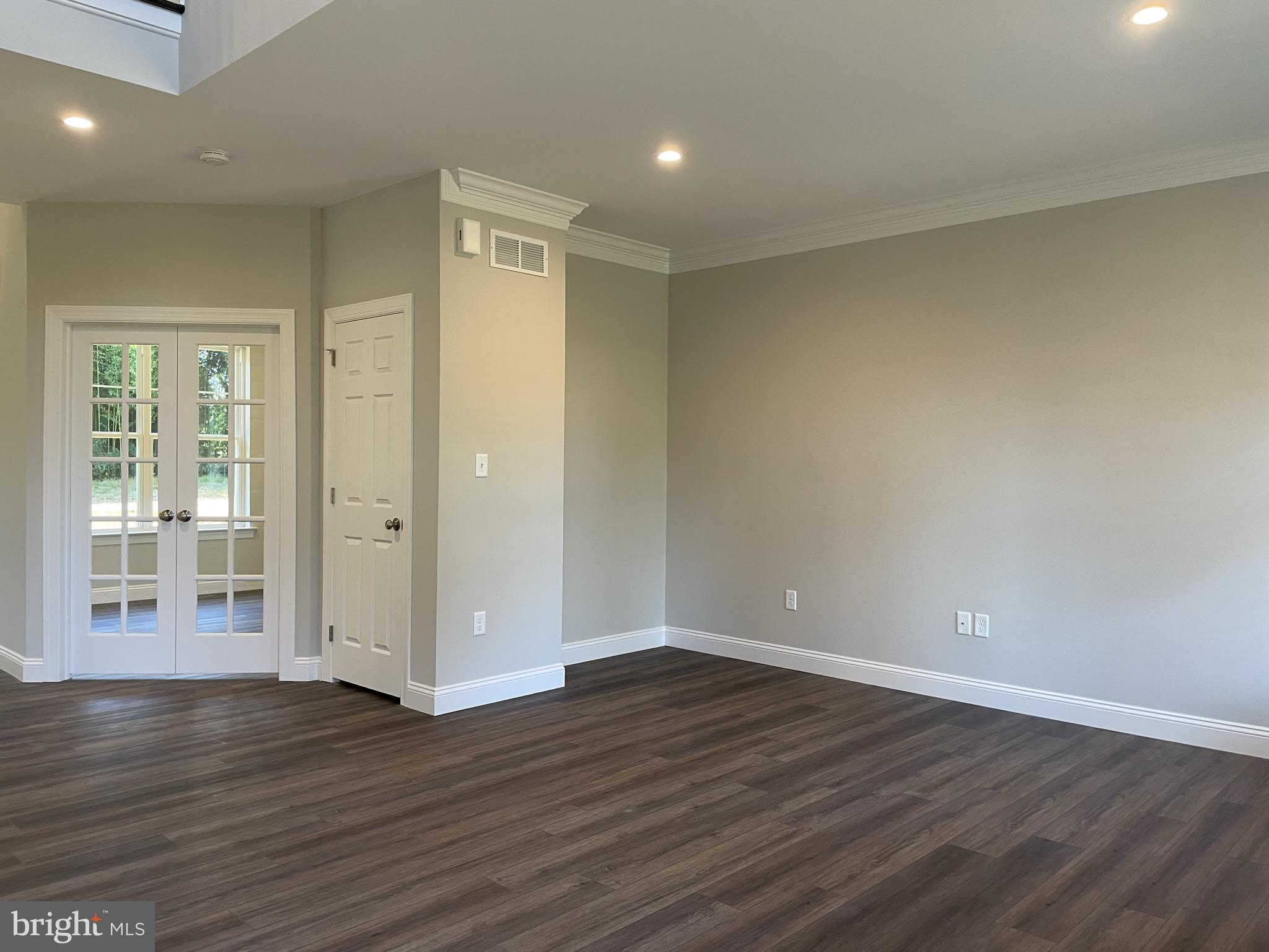 1600 Lower State Road Lower Gwynedd, PA 19002 - Photo 4 of 18 wooden floor in an empty room with wooden floor and a window