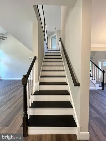 a view of entryway with wooden floor