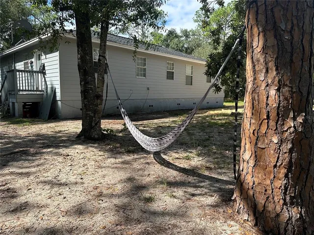 a view of outdoor space and yard