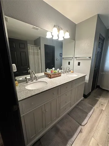 a room with a bed and furniture