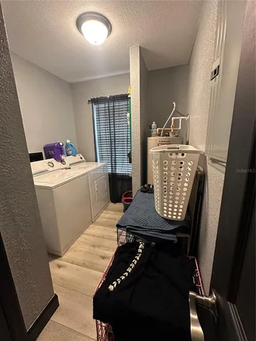 a view of a room with racks on the wall