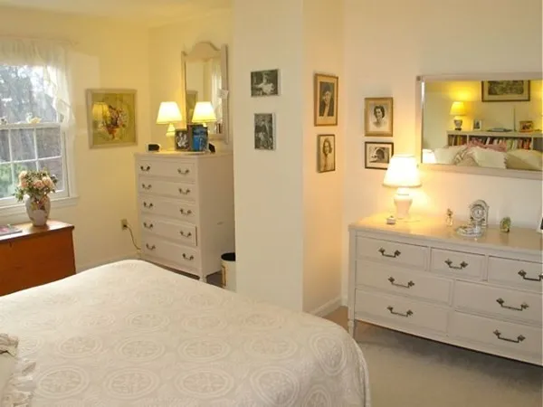 a bathroom with a sink and a window