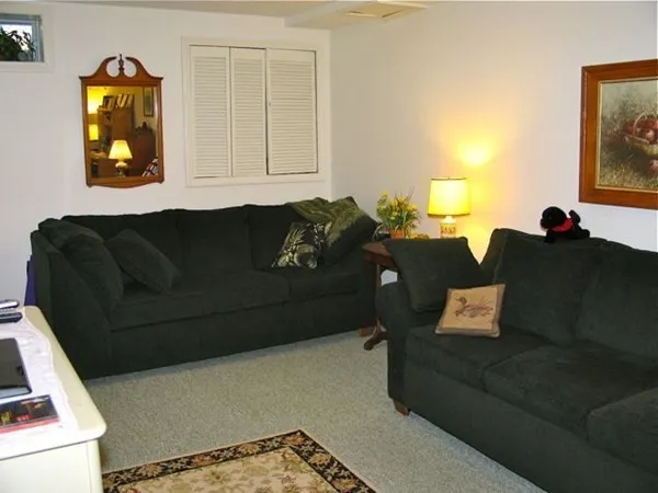 a view of a living room with furniture