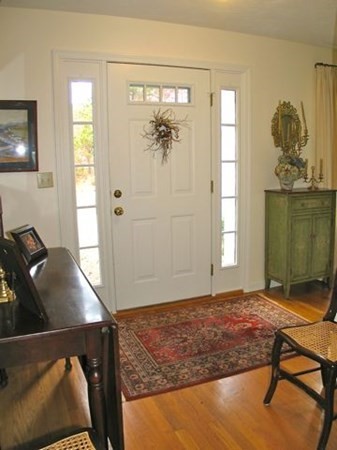 256 Sandpiper Lane Tisbury, MA 02568 - Photo 6 of 25 a living room with furniture and a window