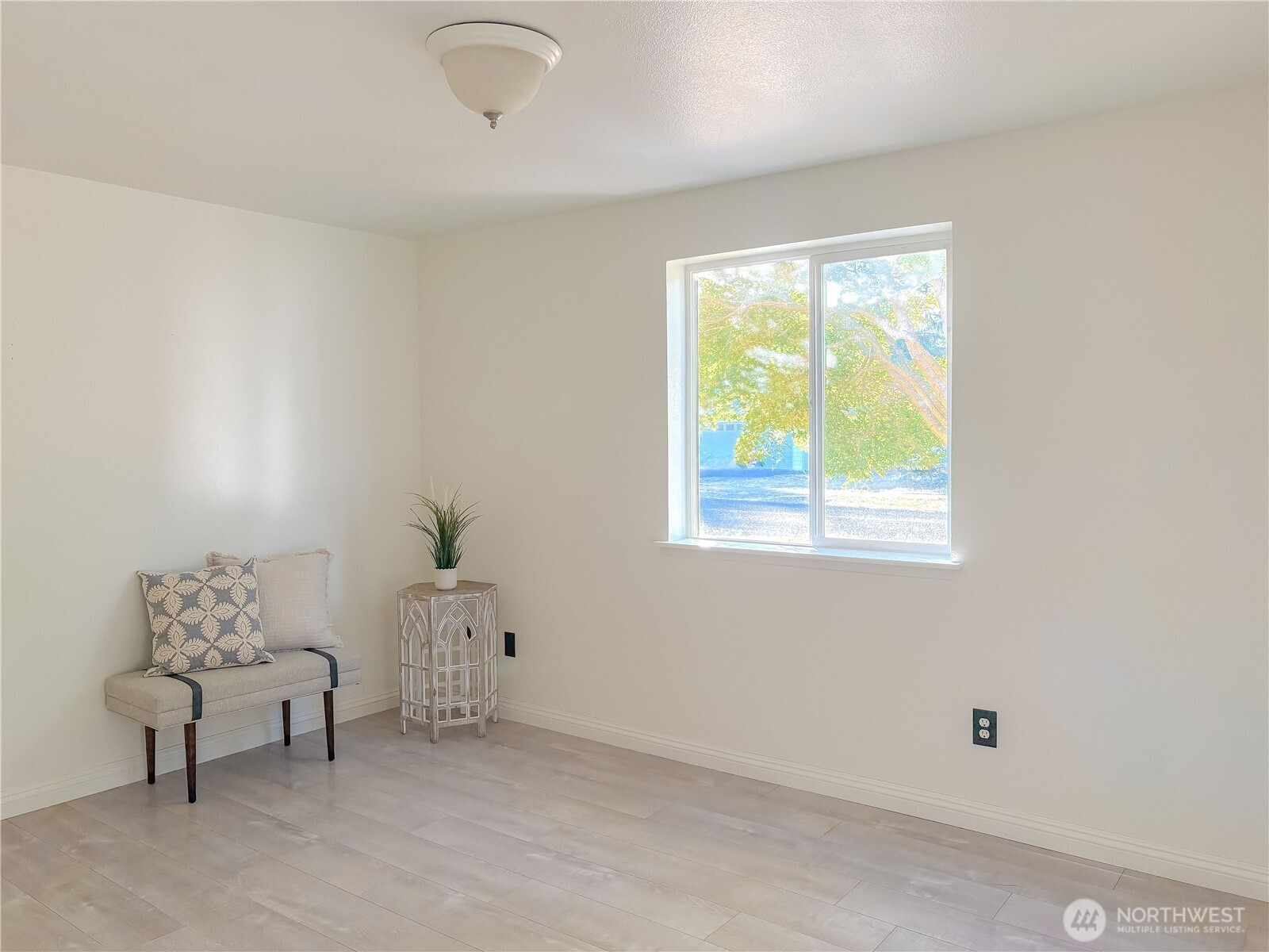 301 Seattle Street East Rainier, WA 98576 - Photo 12 of 18 a living room with furniture and a window
