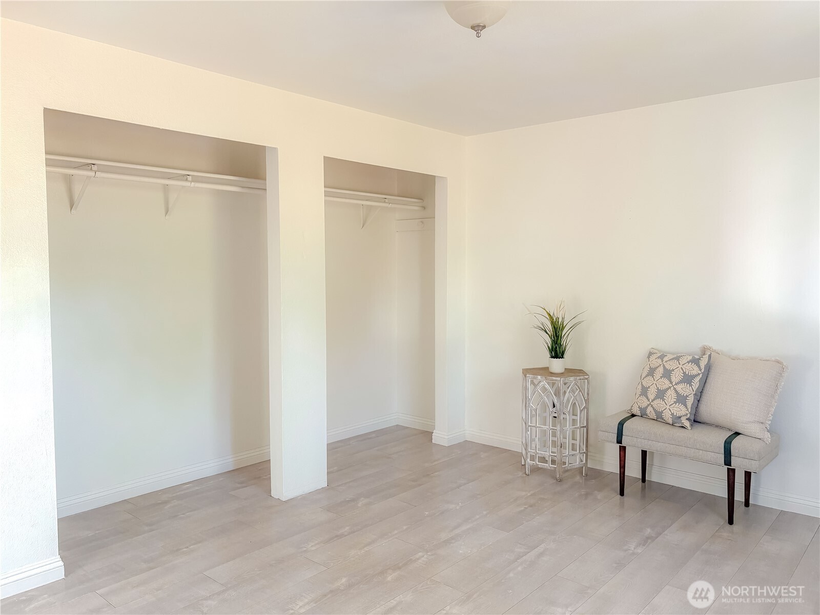 301 Seattle Street East Rainier, WA 98576 - Photo 13 of 18 a view of a room with white walls and bench