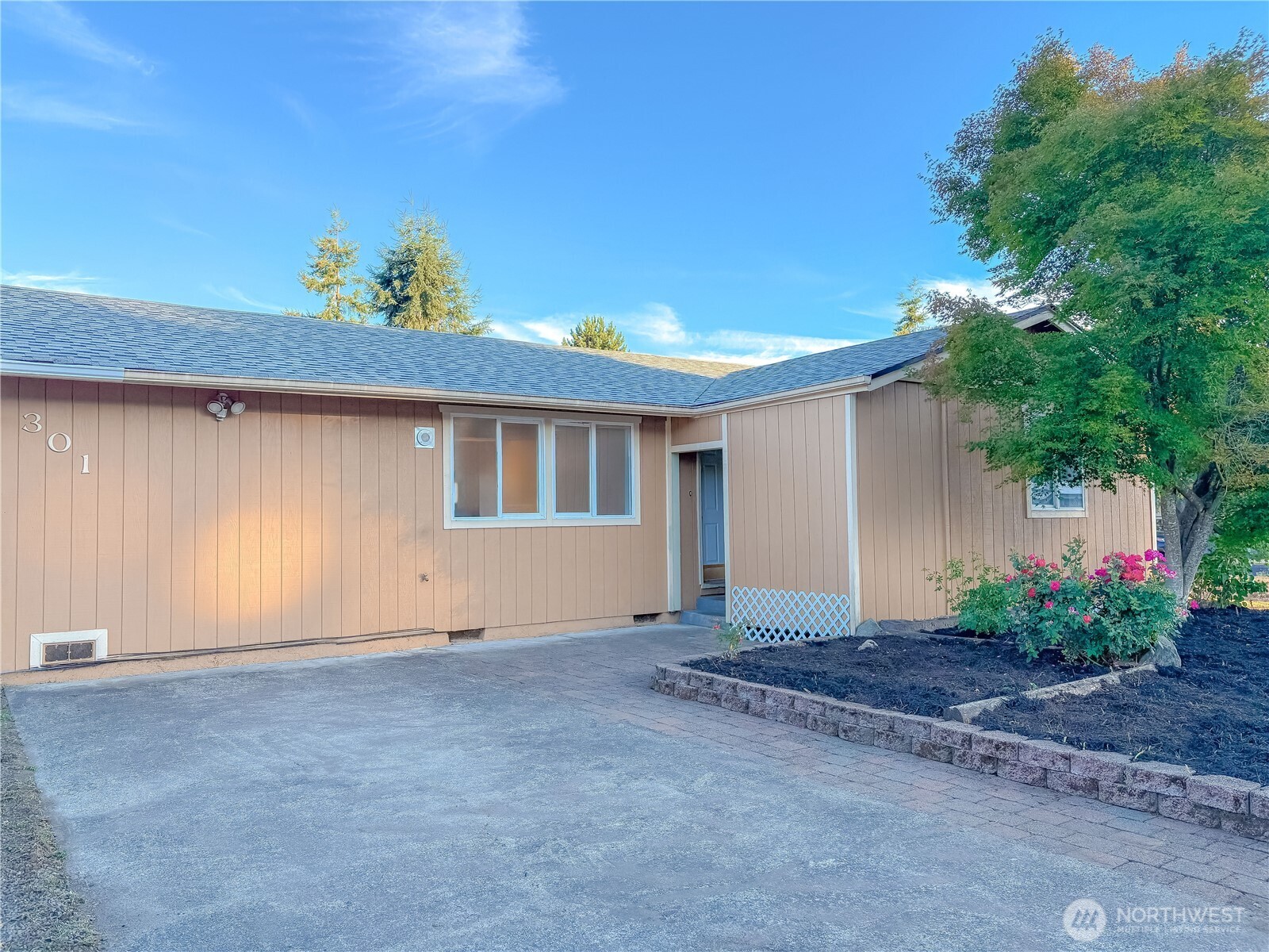 301 Seattle Street East Rainier, WA 98576 - Photo 3 of 18 a front view of a house with a yard