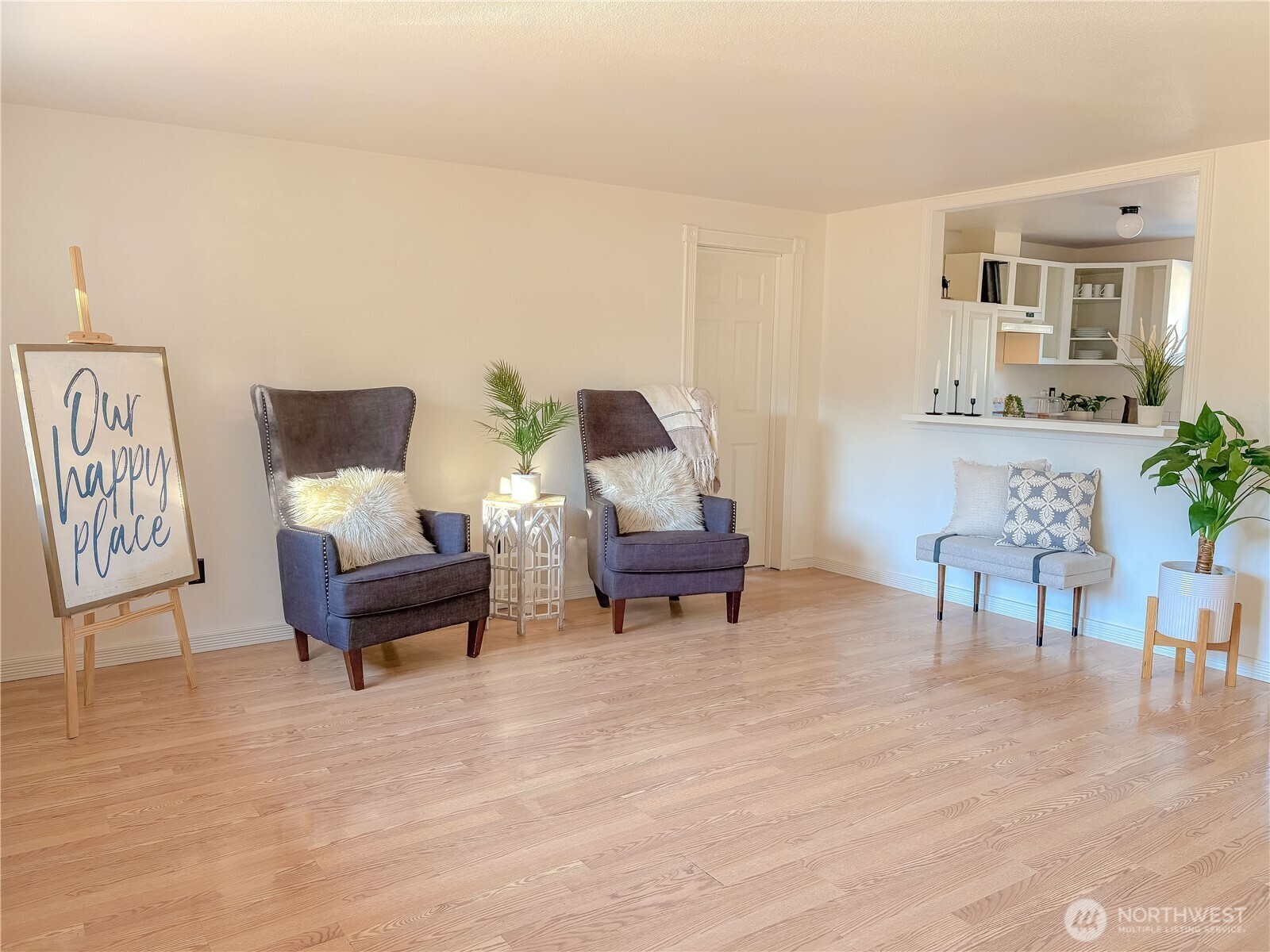 301 Seattle Street East Rainier, WA 98576 - Photo 5 of 18 a living room with furniture and a wooden floor