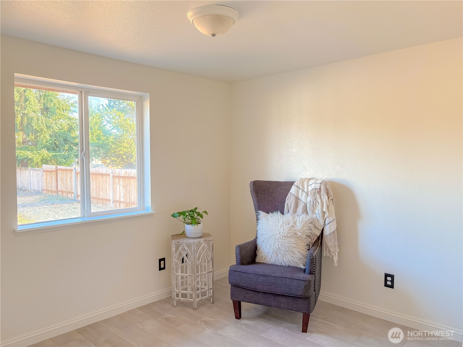 301 Seattle Street East Rainier, WA 98576 - Photo 10 of 18 a living room with furniture and a window