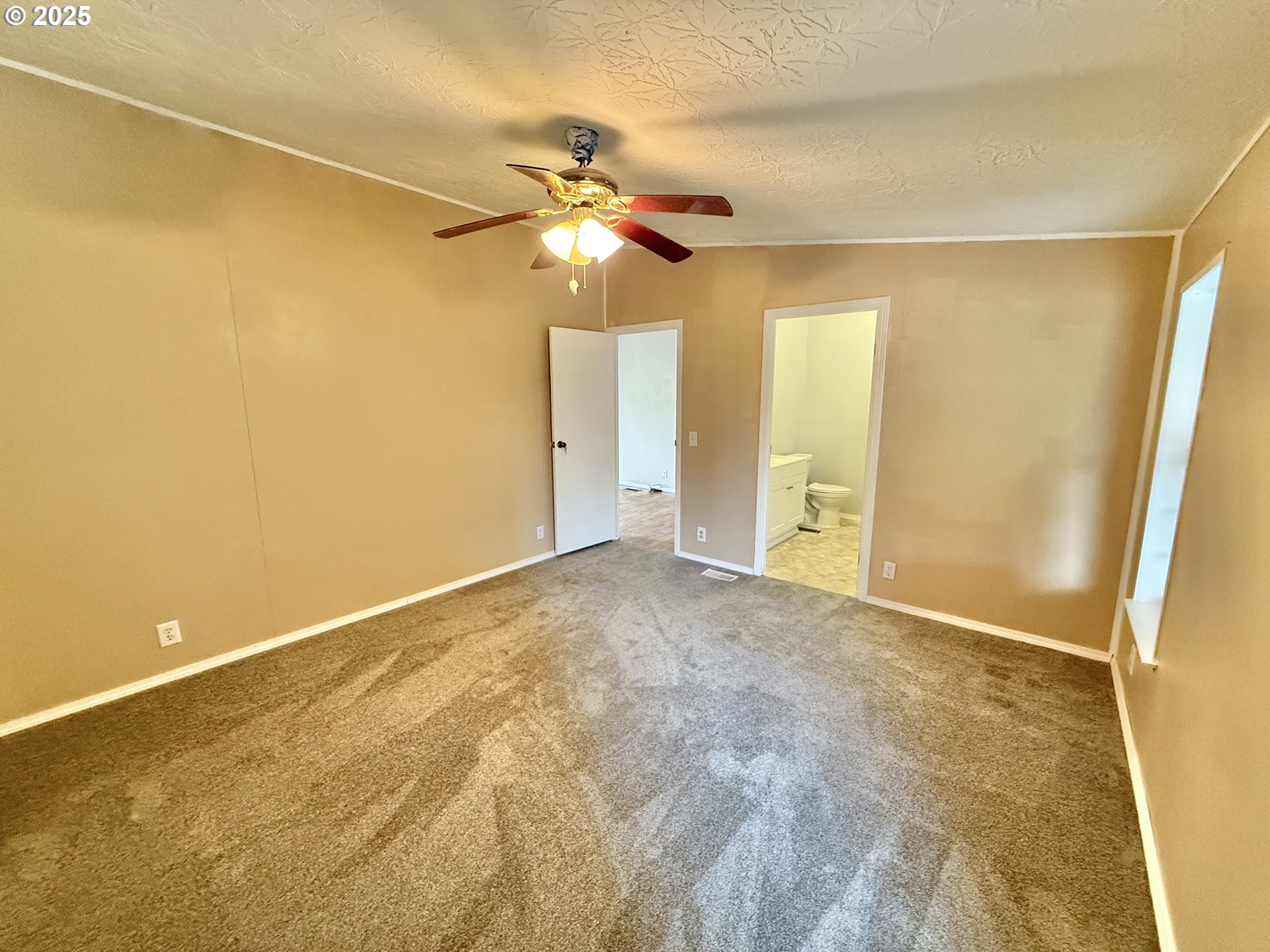 1282 3rd Street, Unit 37 Lafayette, OR 97127 - Photo 17 of 31 a view of an empty room with a window