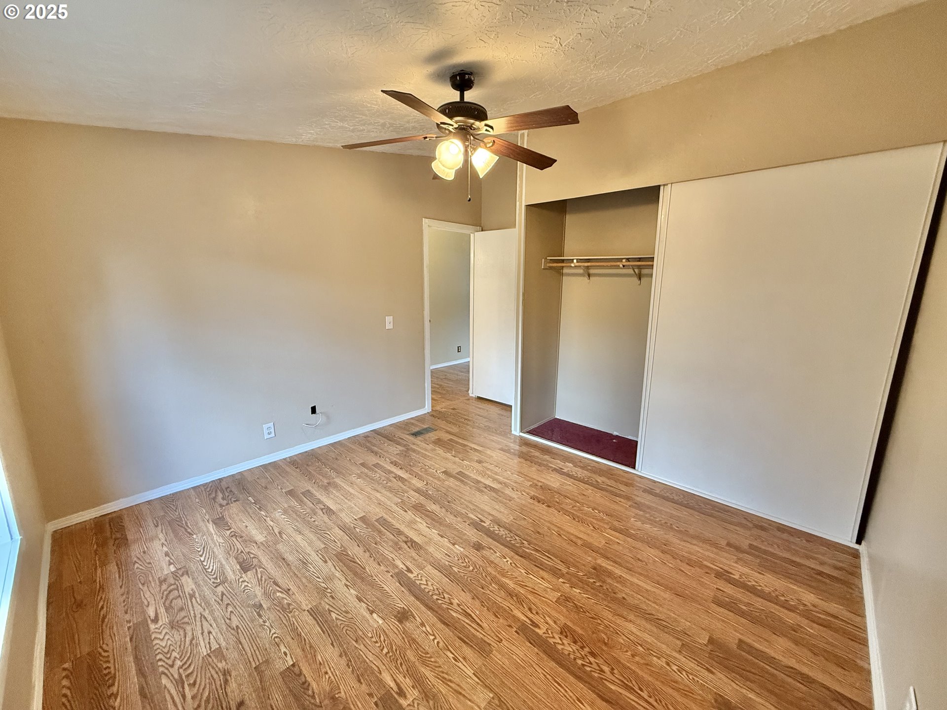 1282 3rd Street, Unit 37 Lafayette, OR 97127 - Photo 30 of 31 a view of empty room with wooden floor