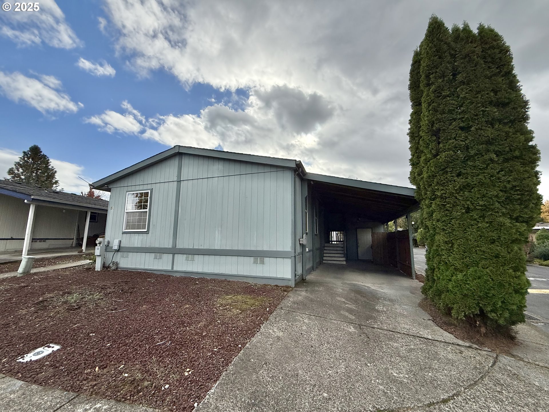 1282 3rd Street, Unit 37 Lafayette, OR 97127 - Photo 31 of 31 a house view with a backyard space